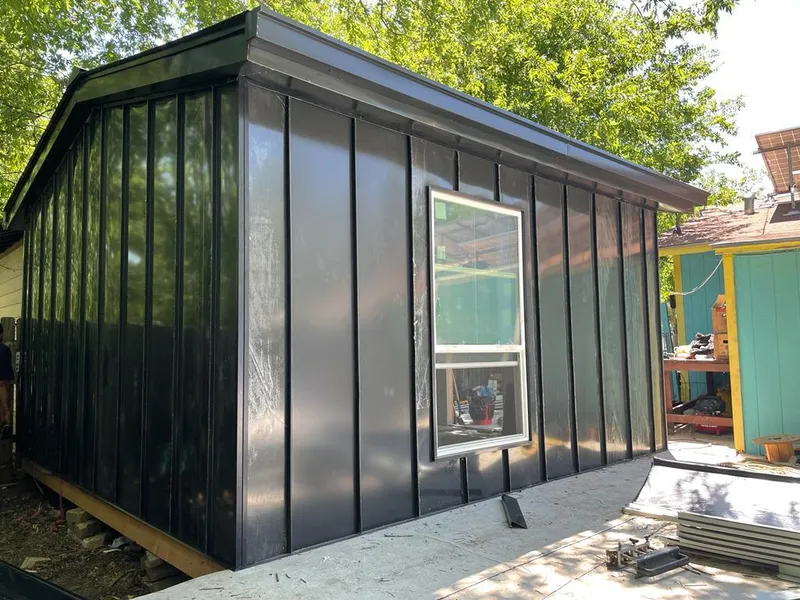 Black standing seam metal wall panels for Metal Roof Installation in Oconomowoc