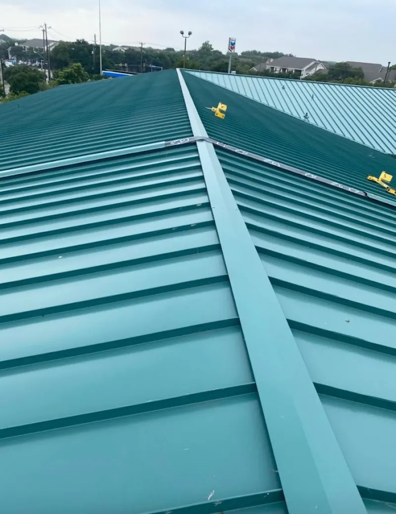 Green commercial metal roof ridge and valley for Metal Roof Repair in Oconomowoc
