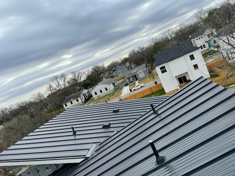 Standing seam metal roof panels with vents for Skylight Repair in Oconomowoc
